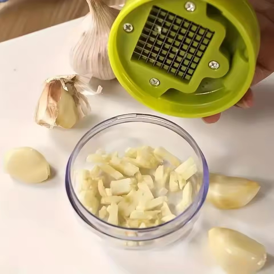 مفرمة ثوم يدوية مع صندوق تخزين - مراجعة Kitchen Job وسعره